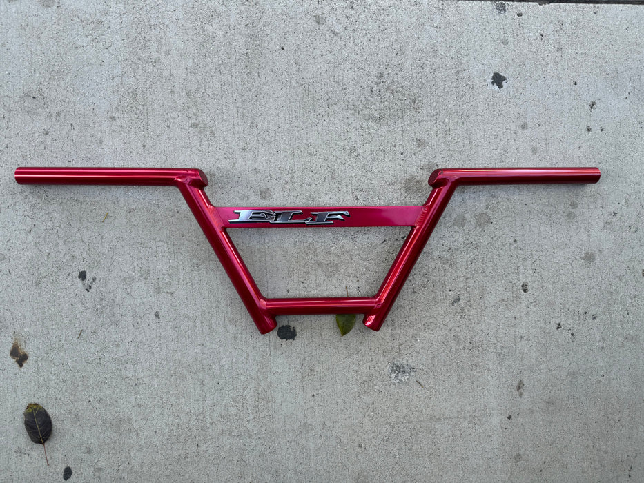 front view of the 6.5″ Elf Product Alloy Pro Cruiser Blast bars in red, vintage bmx bars, elf bmx bars, elf blast bars