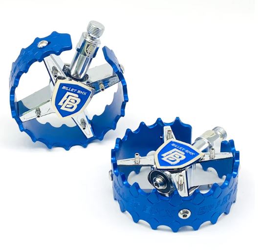 top view of billet bmx pro shield pedals in blue