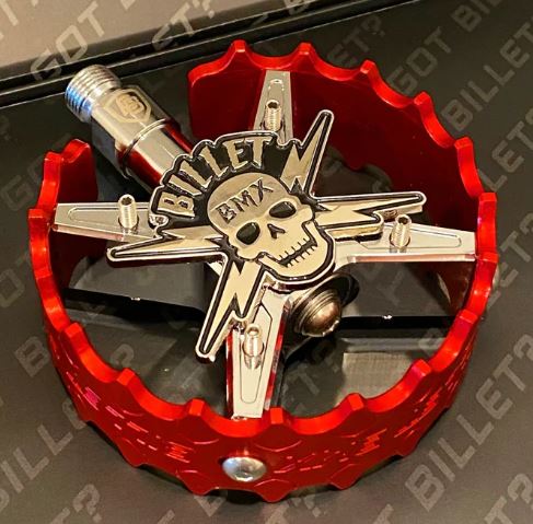 top view of skull pro round series pedals in red