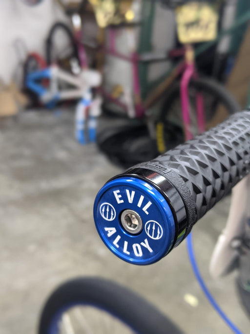 front view of evil alloy bar end in blue